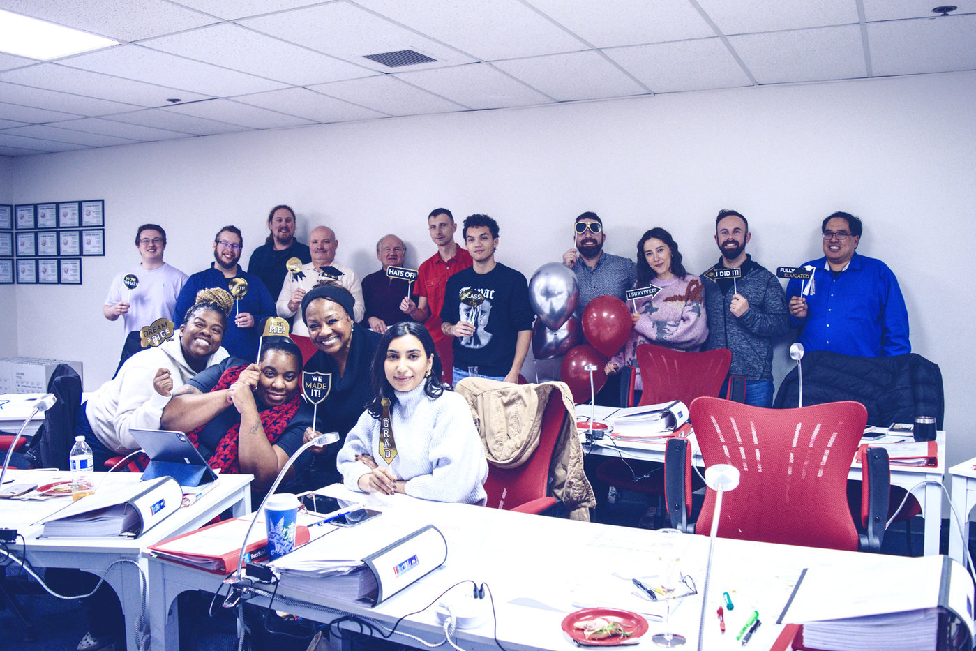 The January 2024 Flight Innovation graduation group together in the classroom